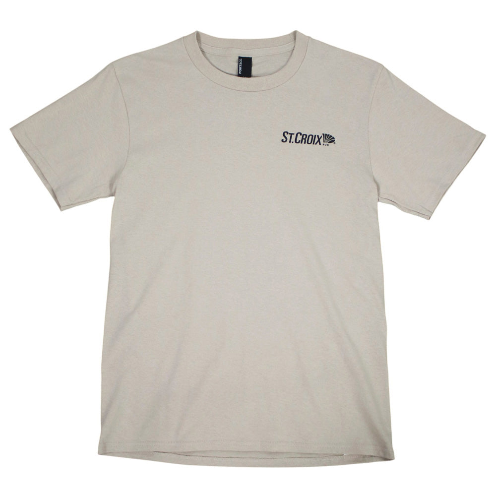 Front of a tan t-shirt with a black st.croix logo on the let chest.
