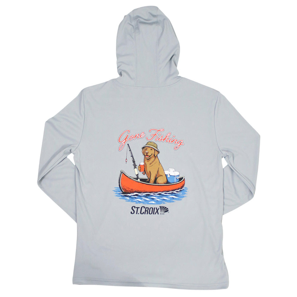 A grey hooded long sleeve with a graphic of a golden retriever in a boat with a fishing rod, featuring the text "gone fishing. St. Croix".

